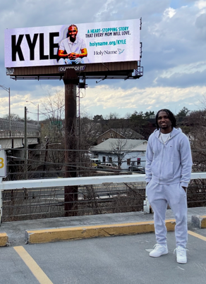 Kyle Hewlett speaking to students about his recovery after surviving cardiac arrest, describing how he found strength and purpose through teaching CPR.